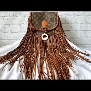 Luxe Leathered Louis Vuitton Fringe GM St. Cloud